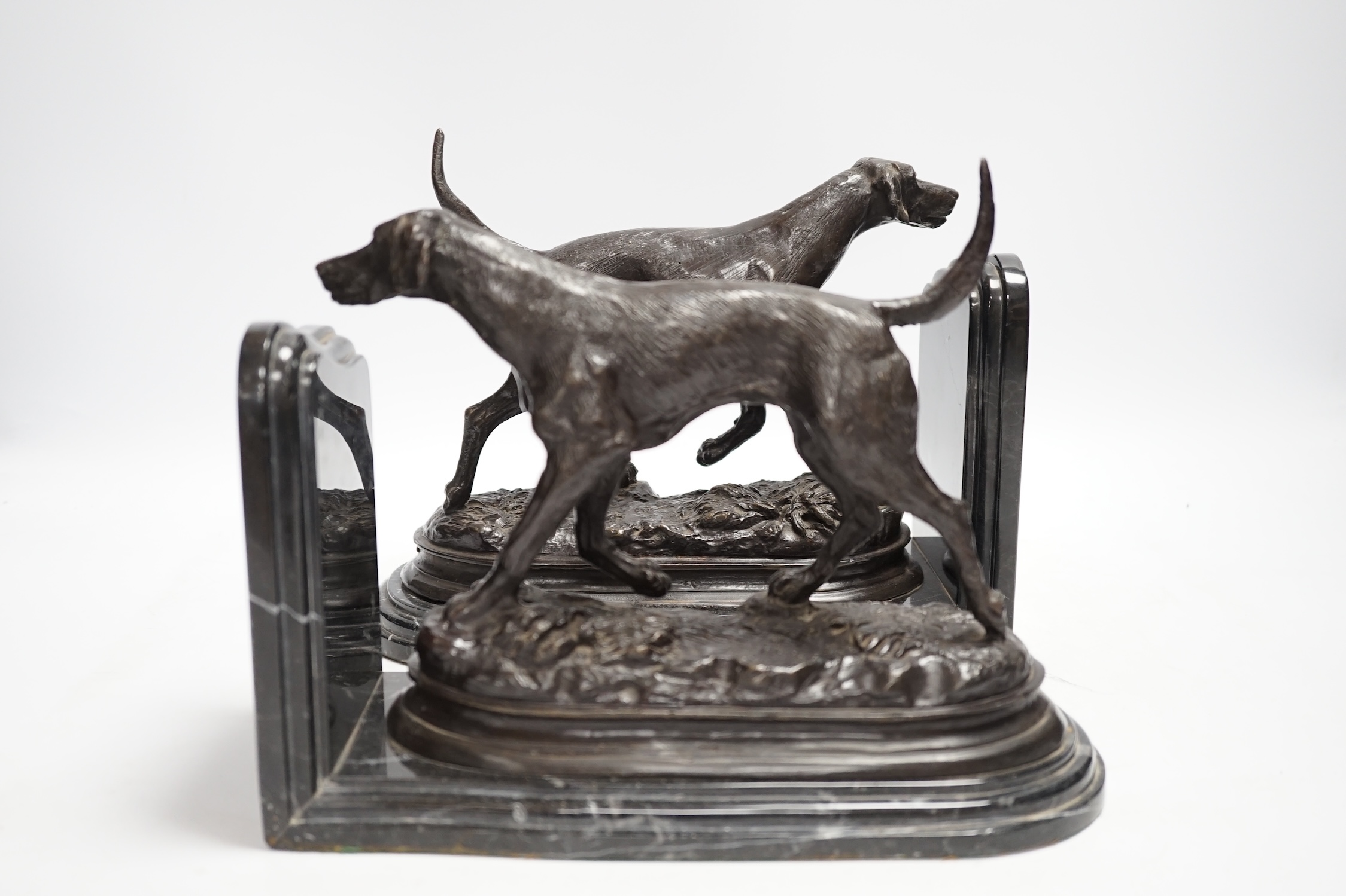 After Pierre-Jules Mêne (1810-1879), a pair of bronze models of hunting hounds